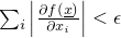 $\sum_i \left|\frac{\partial f(\underline{x})}{\partial x_i}\right| < \epsilon$